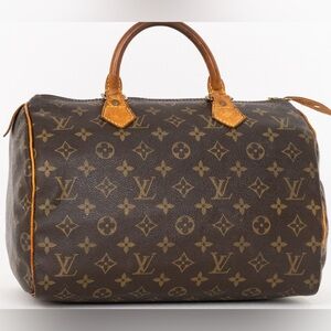 Louis Vuitton 100%Authentic . LV Speedy 30 sold everywhere for over $1000.